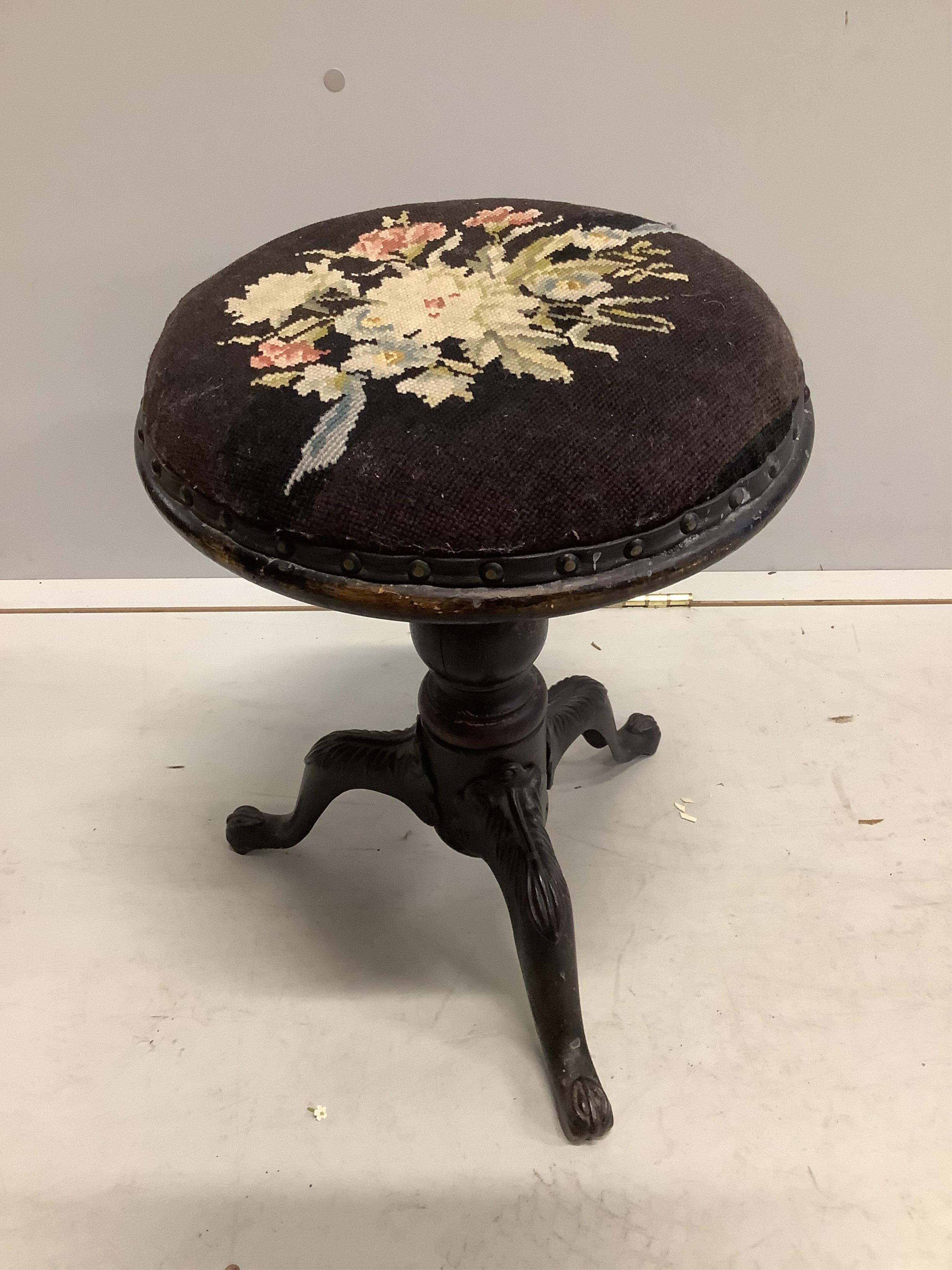 A Regency mahogany circular adjustable piano stool and a Victorian beech and cast iron piano stool. Condition - poor to fair